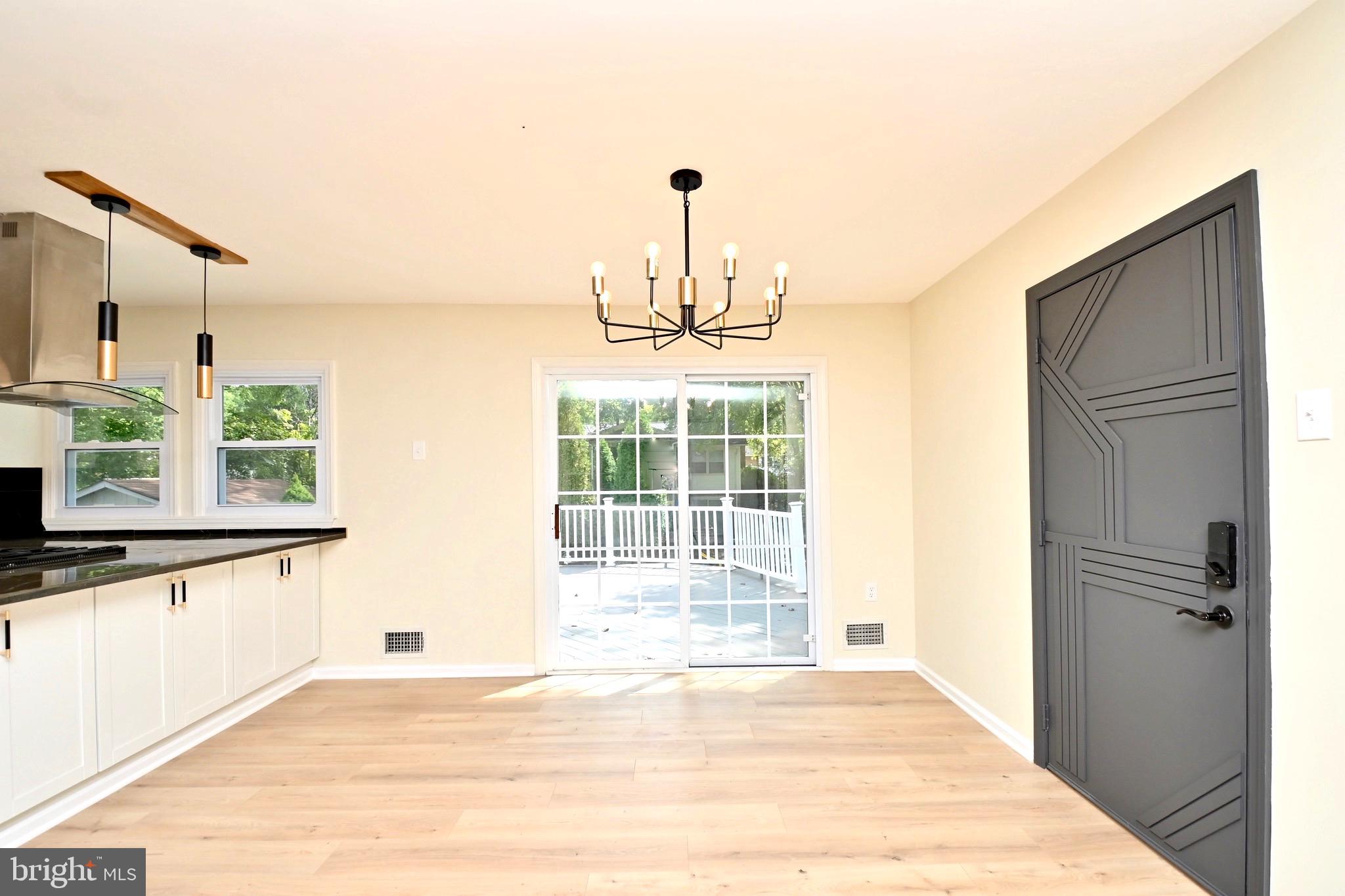 7215 Willow Oak Place Springfield, VA 22153 - Photo 8 of 39 a view of an empty room with a window