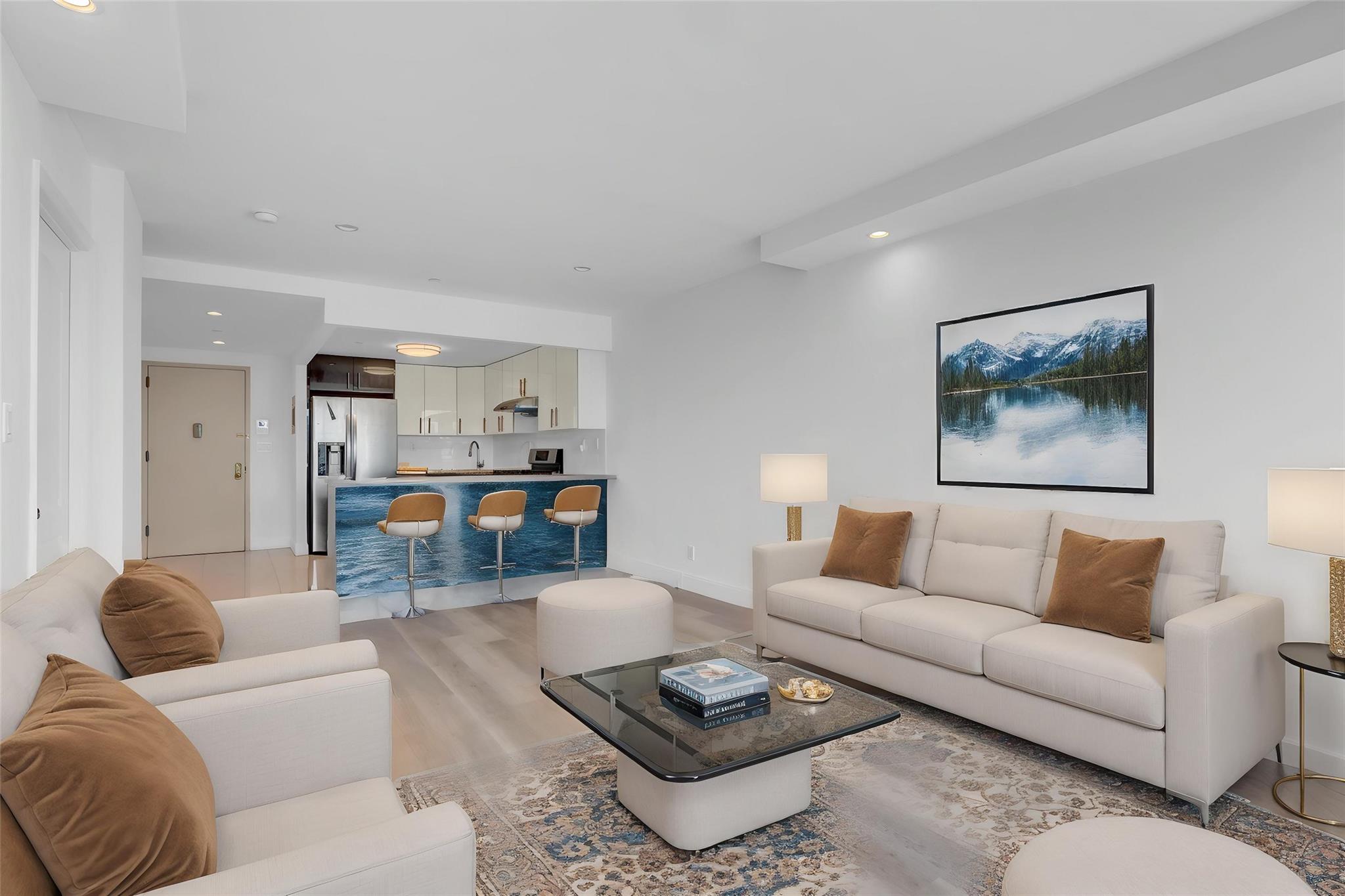 Living room featuring light wood-style flooring, recessed lighting, and baseboards