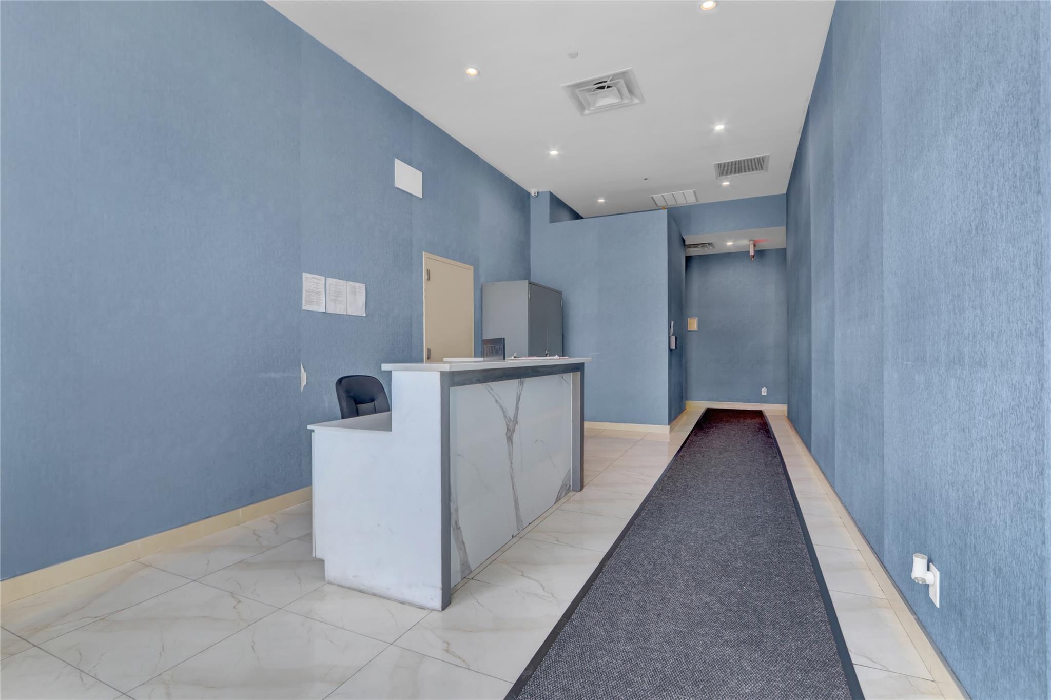 45-16 83rd Street, Unit E6J Queens, NY 11373 - Photo 13 of 19 Reception featuring visible vents