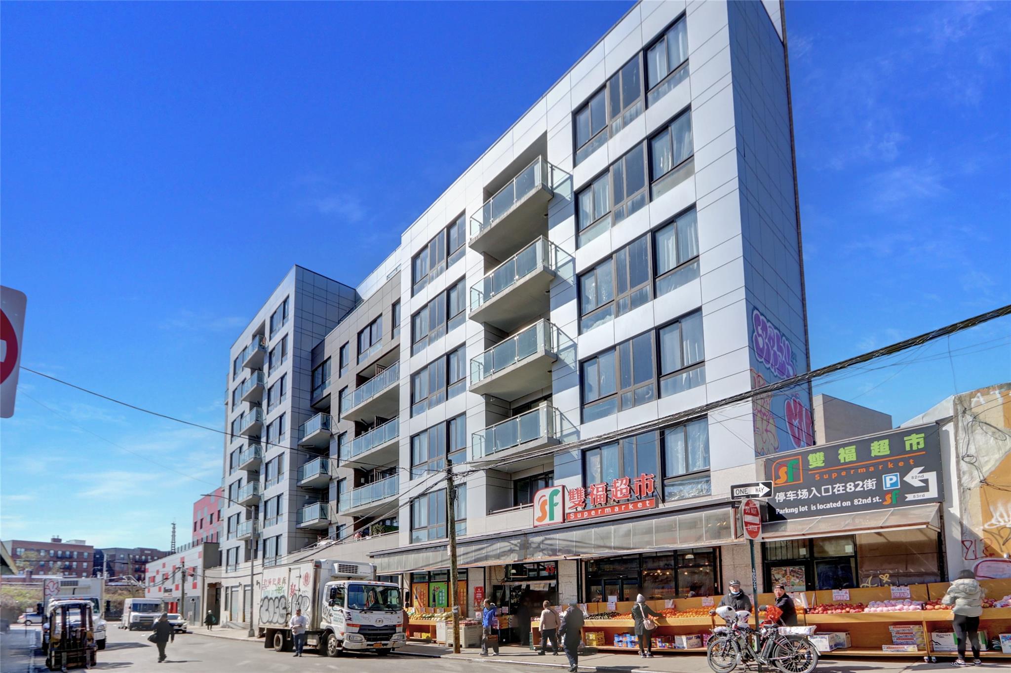 45-16 83rd Street, Unit E6J Queens, NY 11373 - Photo 18 of 19 View of building exterior