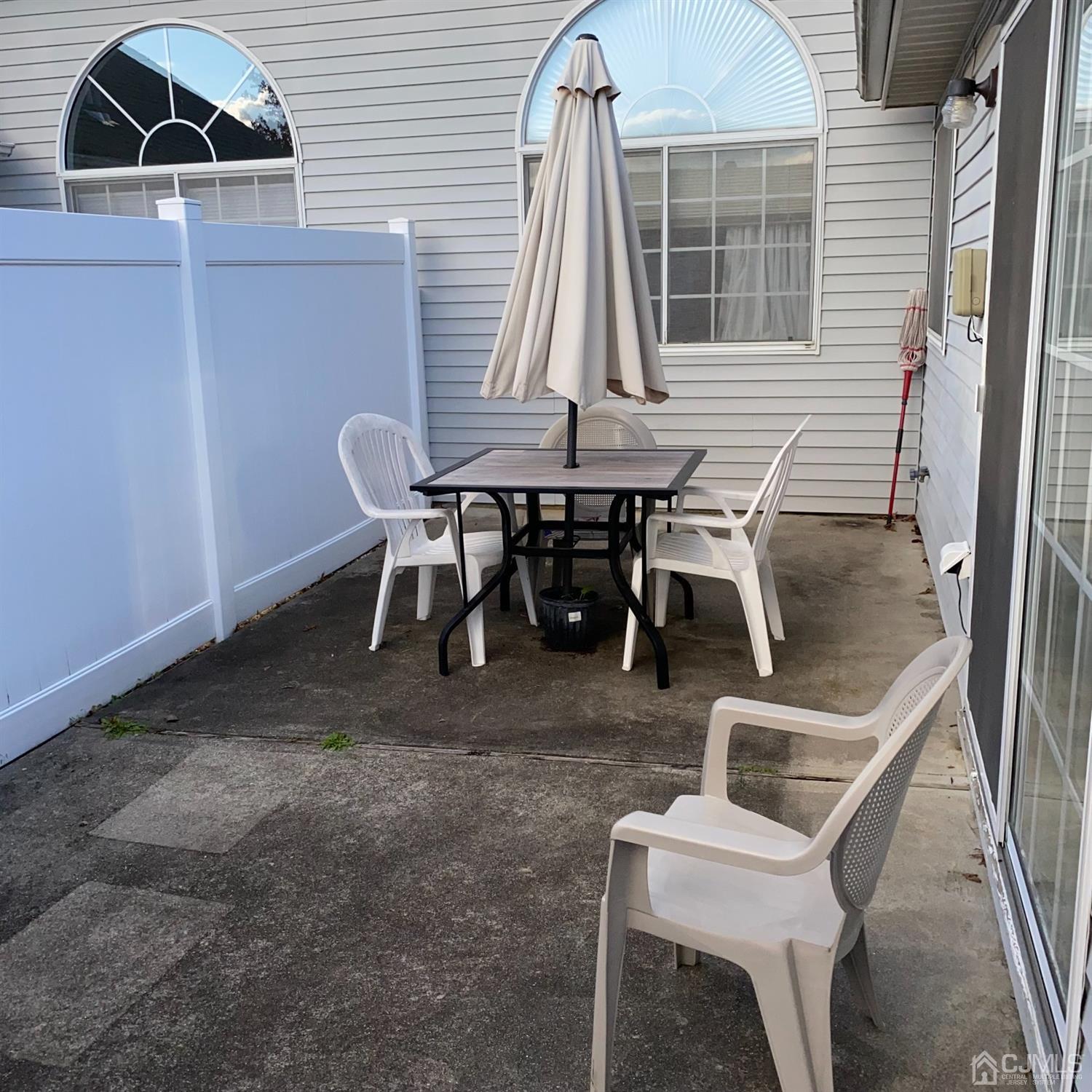 838 Vail Road, Unit A Monroe Township, NJ 08831 - Photo 16 of 16 a view of a house with backyard and porch