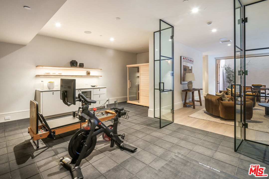 15620 Woodvale Road Encino, CA 91436 - Photo 35 of 37 a view of a room with gym equipment