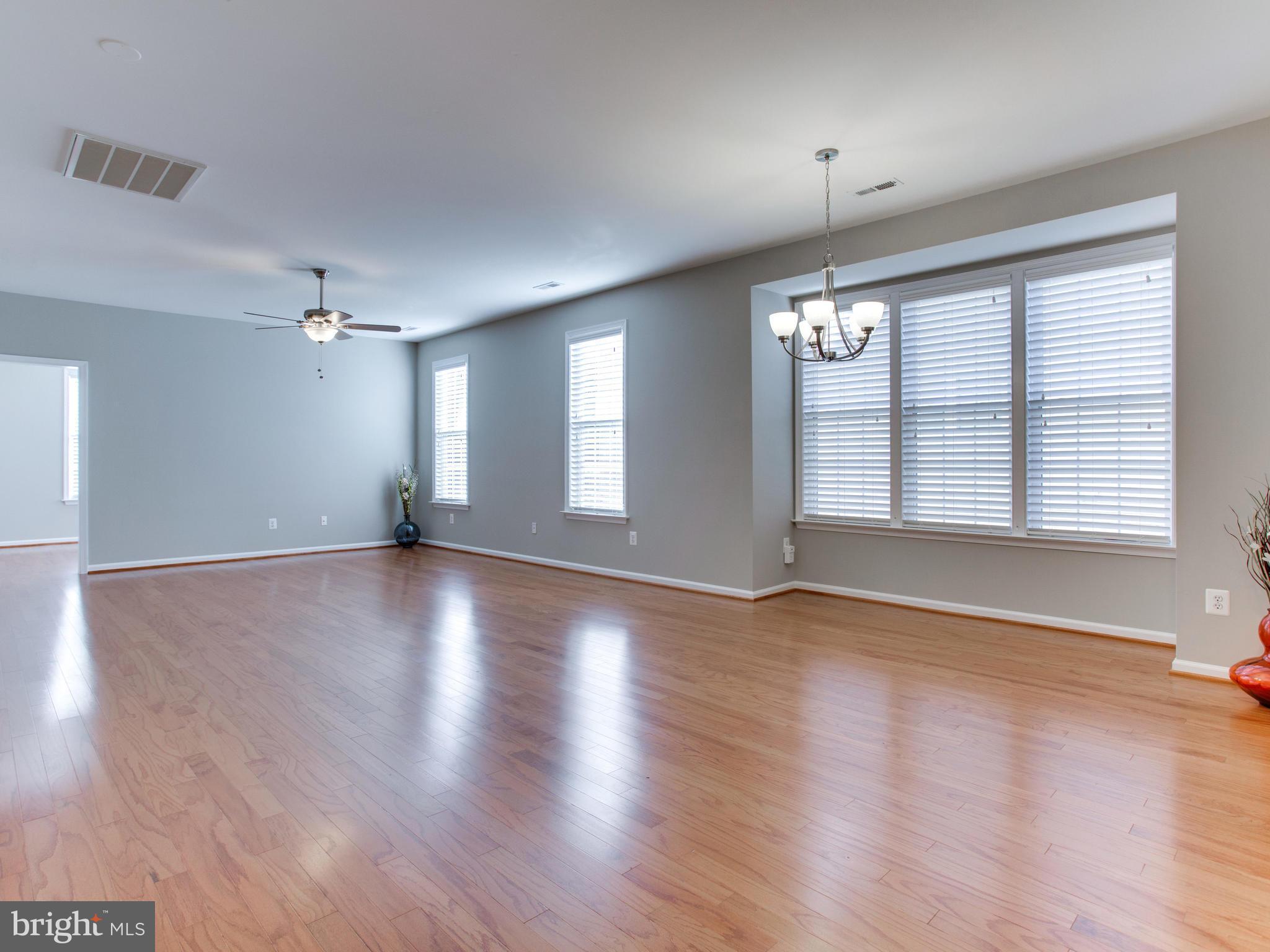 13583 Ryton Ridge Lane Gainesville, VA 20155 - Photo 12 of 28 Living Room with NEW hardwoods & fan