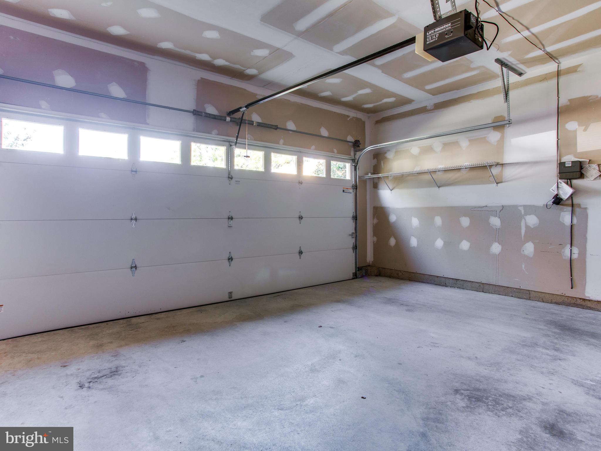 13583 Ryton Ridge Lane Gainesville, VA 20155 - Photo 23 of 28 2 car garage with insulated metal door