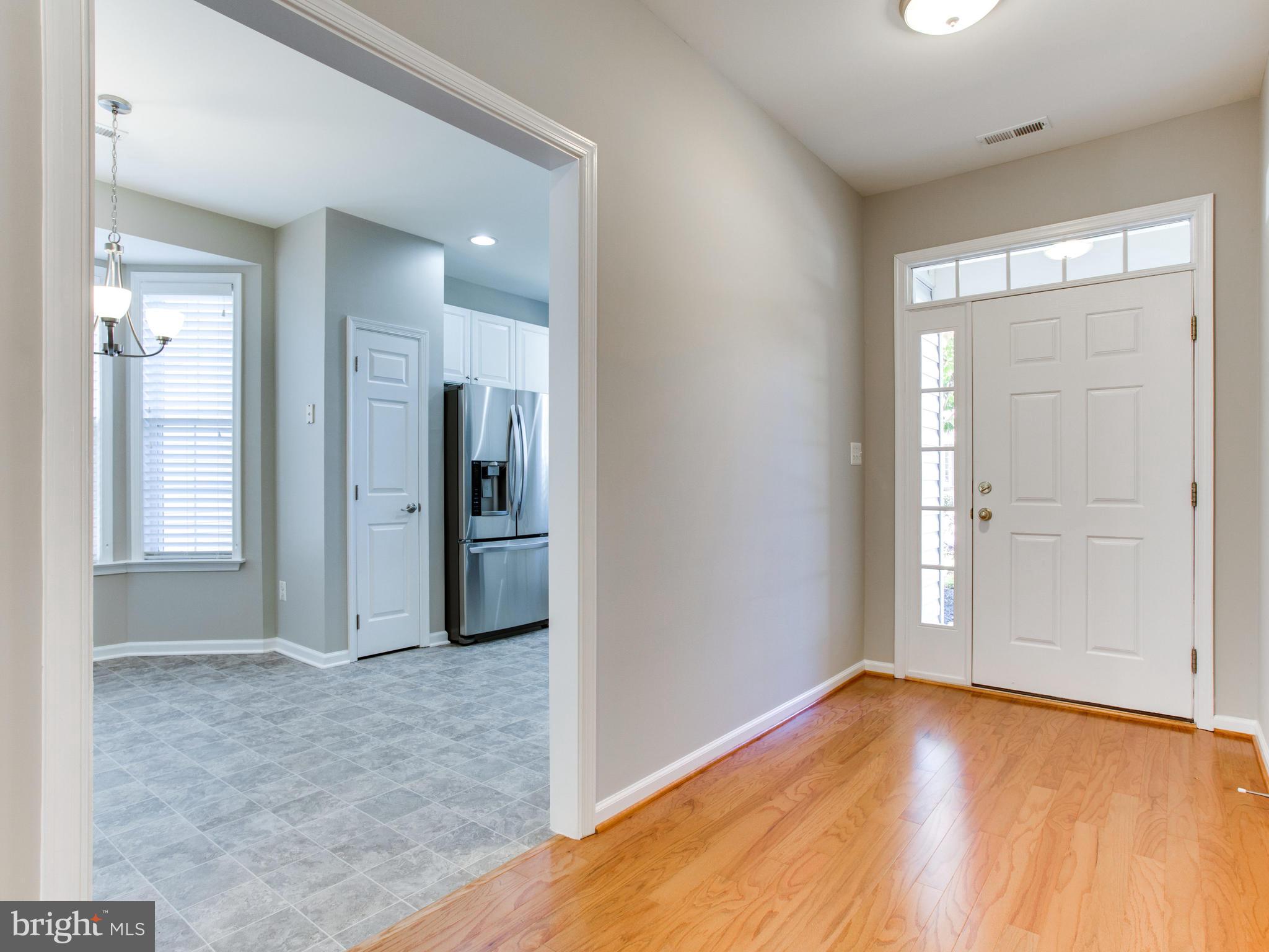 13583 Ryton Ridge Lane Gainesville, VA 20155 - Photo 9 of 28 Welcoming Foyer - new hardwood floor