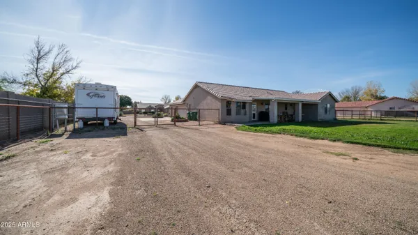 a view of house with outdoor space and street view