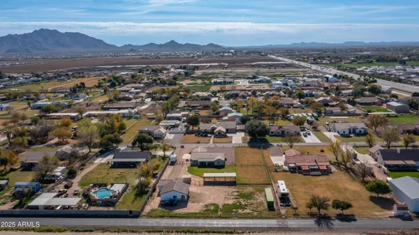 an aerial view of residential house with outdoor space