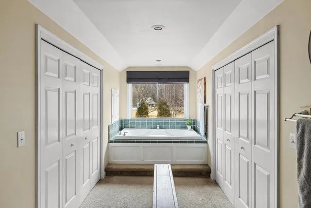 a view of a hallway with a livingroom