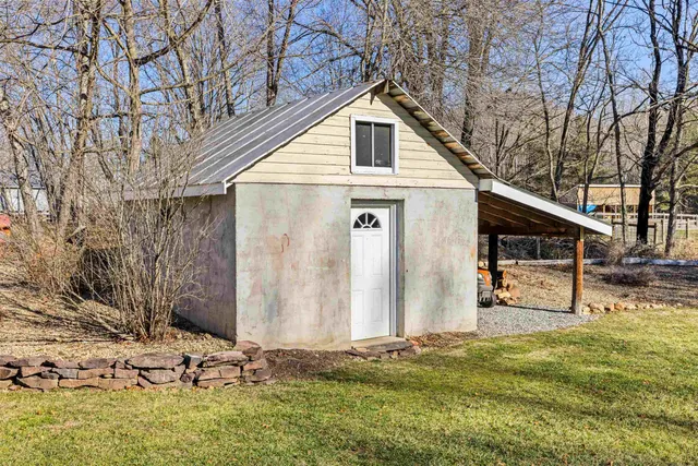 a view of a swimming pool with a patio