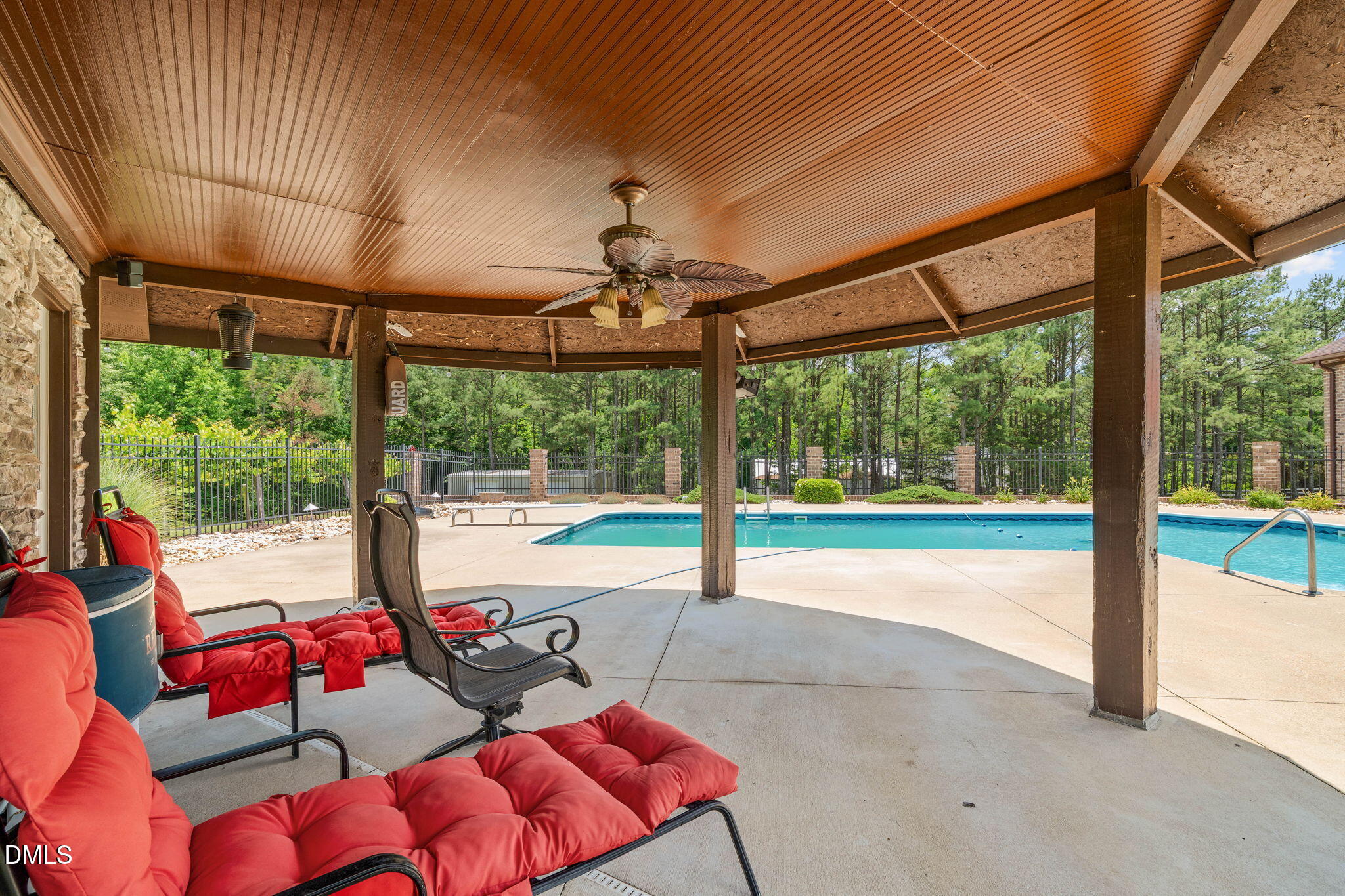 10917 Jordan Road Raleigh, NC 27603 - Photo 7 of 58 a living room with patio furniture and a floor to ceiling window
