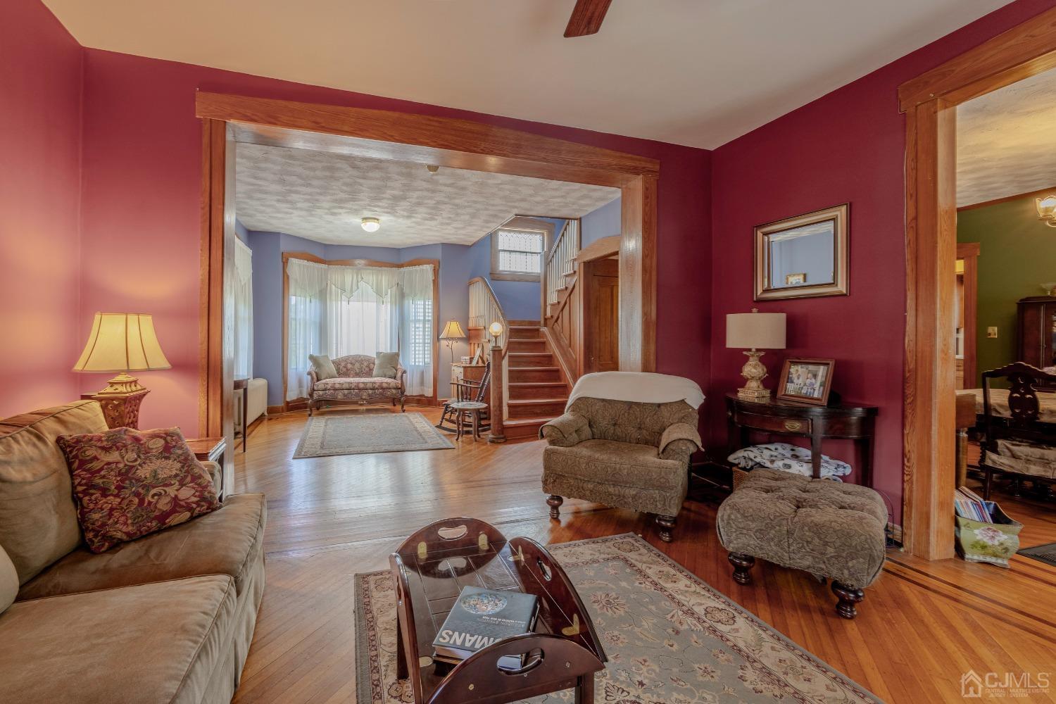 314 Walnut Street Dunellen, NJ 08812 - Photo 13 of 48 a living room with furniture and a lamp