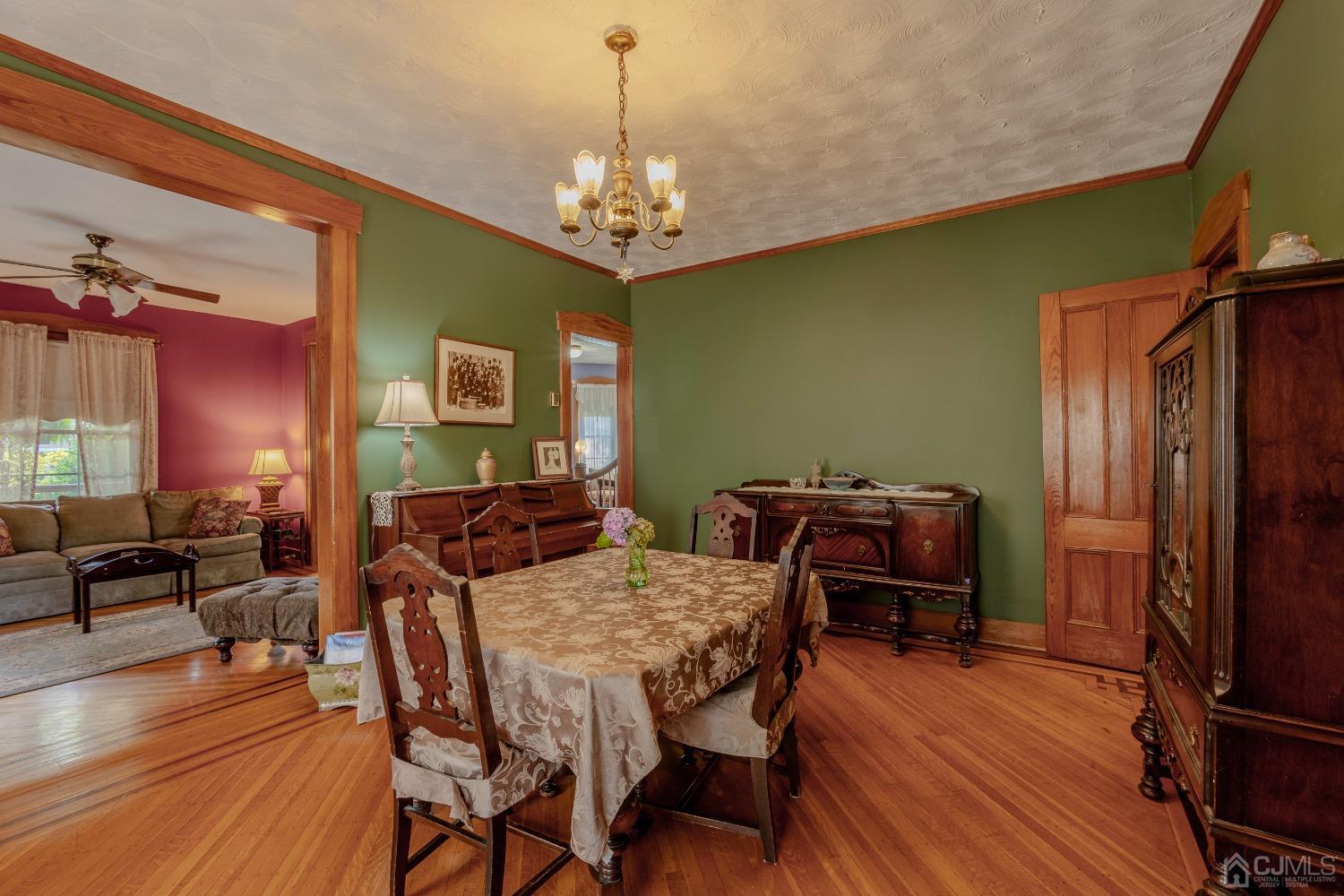314 Walnut Street Dunellen, NJ 08812 - Photo 14 of 48 a view of a dining room with furniture window and wooden floor
