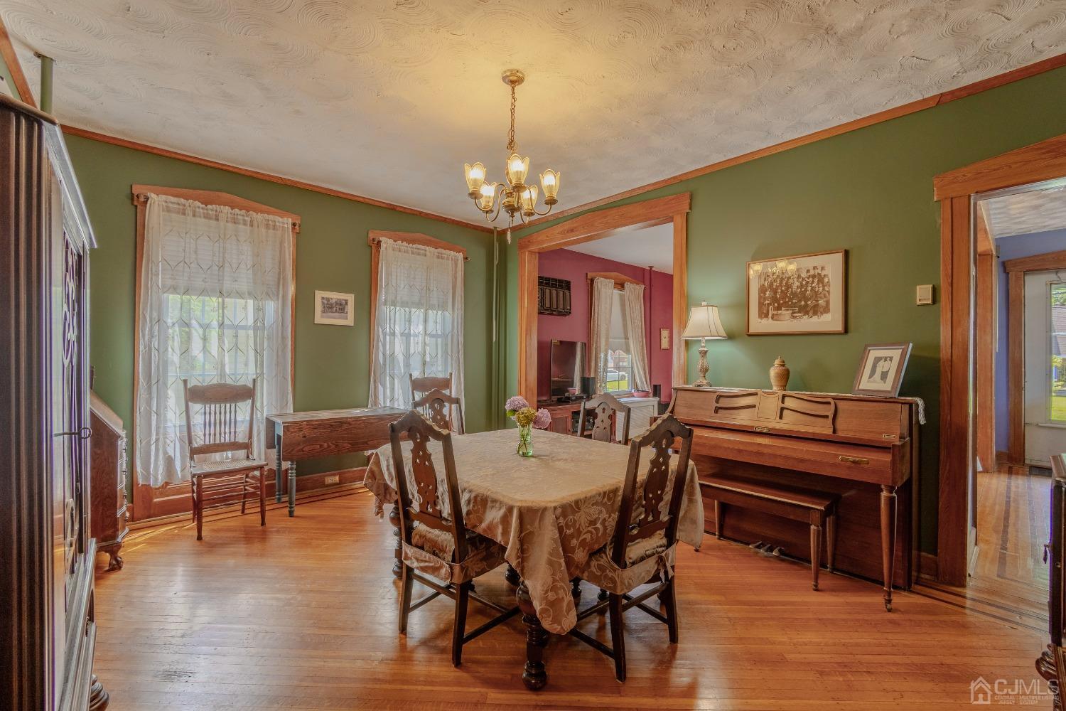 314 Walnut Street Dunellen, NJ 08812 - Photo 15 of 48 a view of a dining room with furniture window and wooden floor