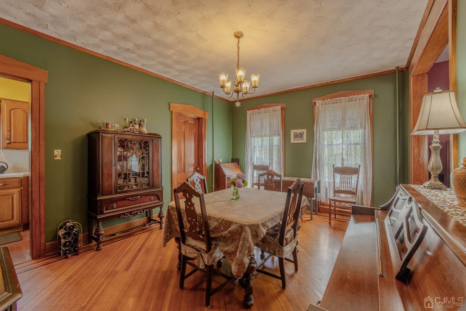 314 Walnut Street Dunellen, NJ 08812 - Photo 16 of 48 a view of a dining room with furniture window and wooden floor