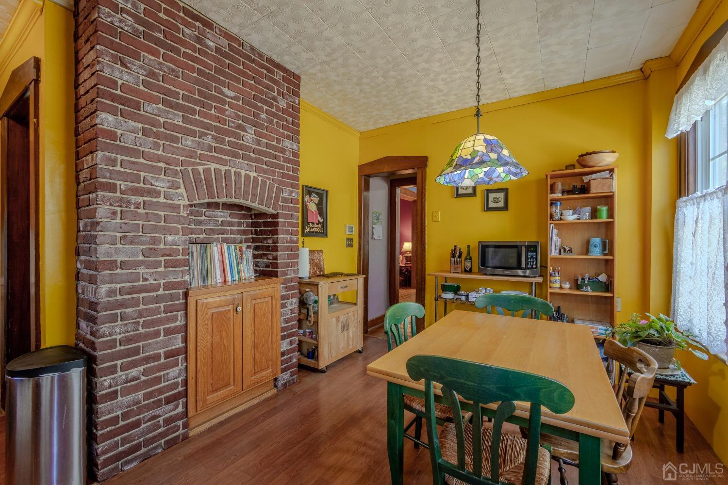 314 Walnut Street Dunellen, NJ 08812 - Photo 20 of 48 a dining room filled with furniture and chandelier