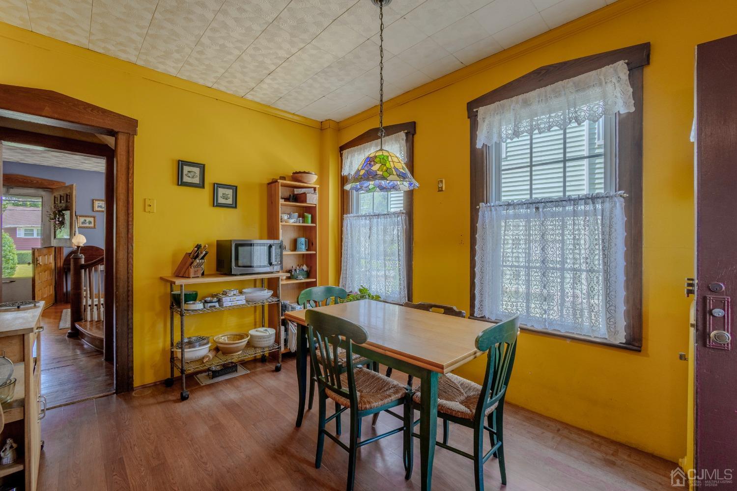 314 Walnut Street Dunellen, NJ 08812 - Photo 21 of 48 a dining room with a table and chairs