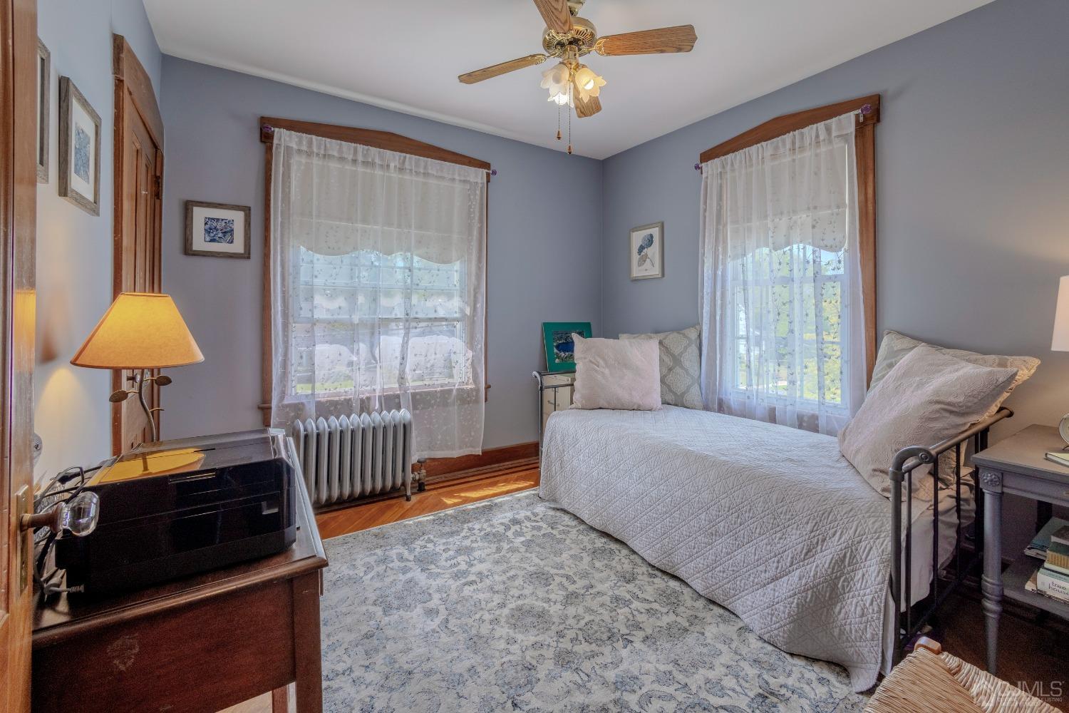 314 Walnut Street Dunellen, NJ 08812 - Photo 28 of 48 a bedroom with a bed and a window