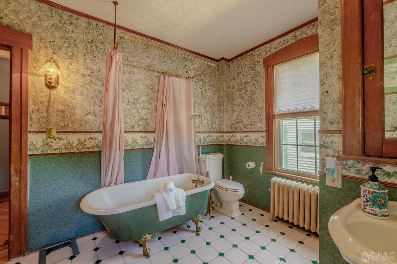 314 Walnut Street Dunellen, NJ 08812 - Photo 31 of 48 a living room with furniture and a window