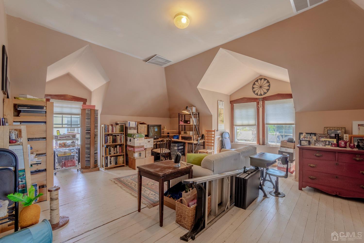 314 Walnut Street Dunellen, NJ 08812 - Photo 34 of 48 a view of a livingroom with furniture and window