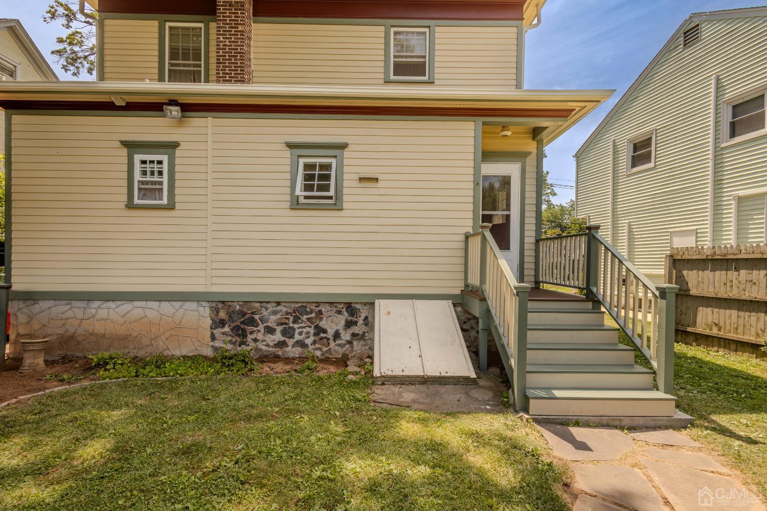 314 Walnut Street Dunellen, NJ 08812 - Photo 36 of 48 a view of a house with a yard