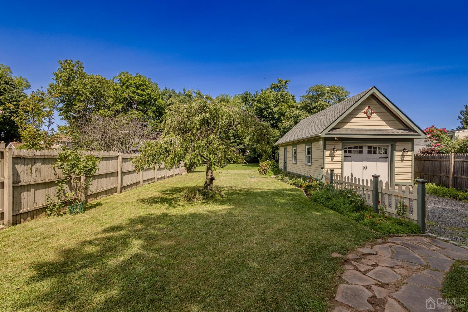 314 Walnut Street Dunellen, NJ 08812 - Photo 37 of 48 a view of a house with a yard