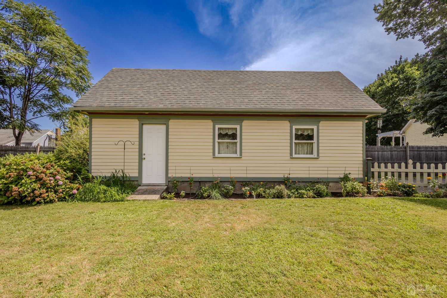 314 Walnut Street Dunellen, NJ 08812 - Photo 42 of 48 a front view of house with yard