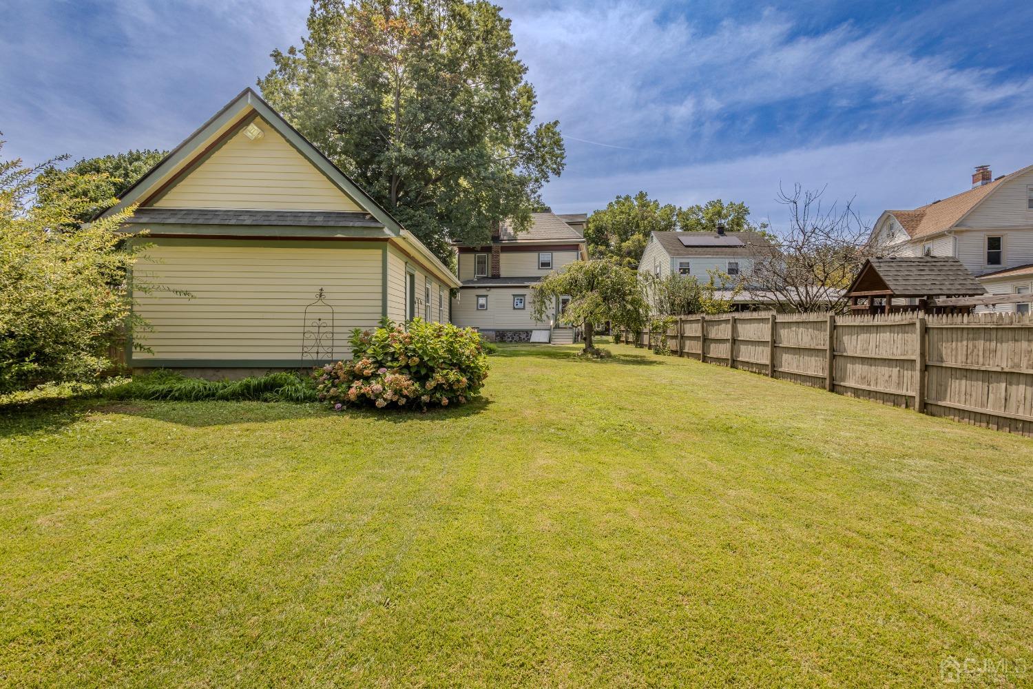 314 Walnut Street Dunellen, NJ 08812 - Photo 46 of 48 a front view of a house with a yard