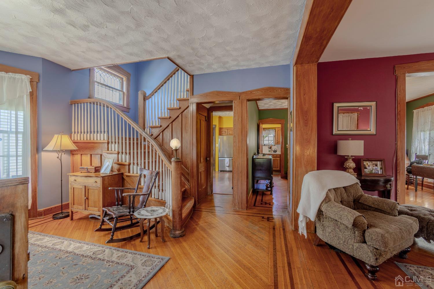 314 Walnut Street Dunellen, NJ 08812 - Photo 7 of 48 a living room with furniture and a wooden floor