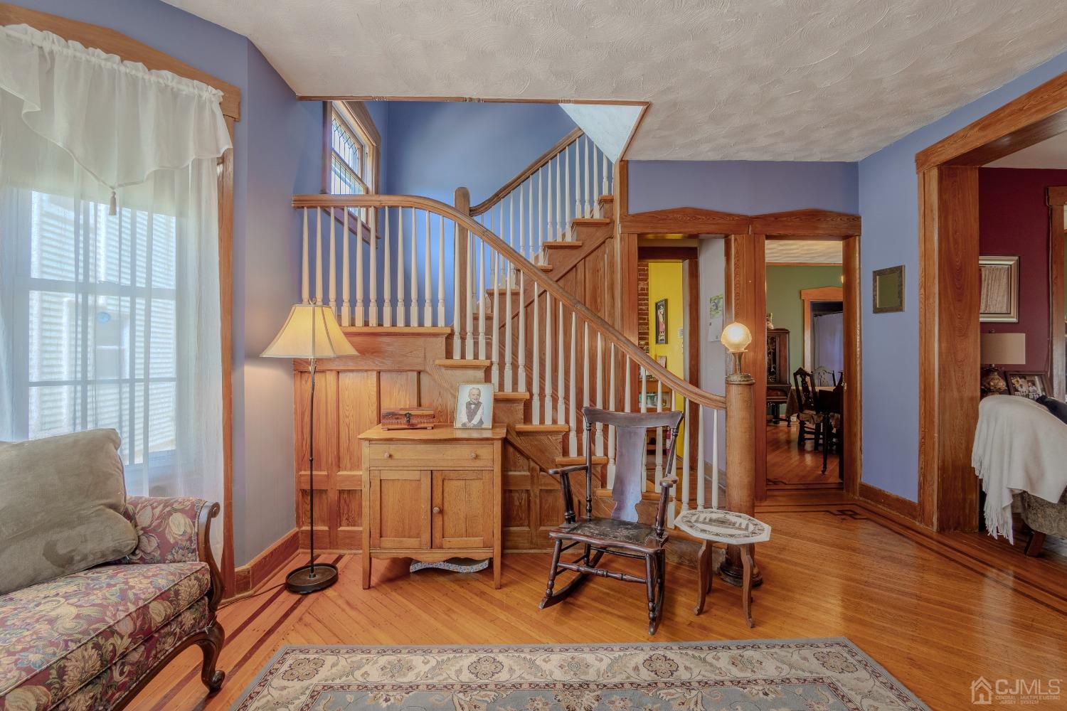 314 Walnut Street Dunellen, NJ 08812 - Photo 10 of 48 a view of a livingroom with furniture and a window