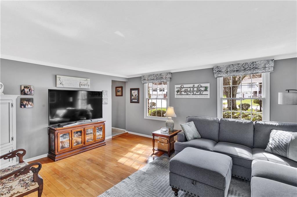 9 Quail Court Export, PA 15632 - Photo 14 of 35 Beautiful Custom Fabric Blinds in the 17x13 Living Room and Dining/Kitchen Areas.