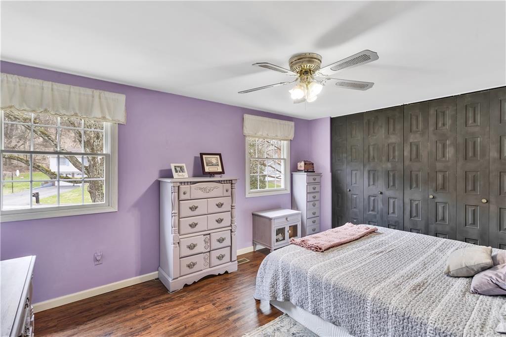 9 Quail Court Export, PA 15632 - Photo 27 of 35 Spacious 15x11 Bedroom #2 on Upper Level with Wall of Closets and Ceiling Fan.