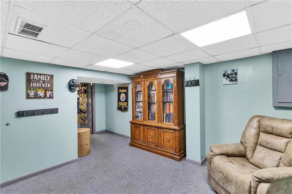 9 Quail Court Export, PA 15632 - Photo 32 of 35 18x11 Finished Basement Area with Fleck/Painted Concrete Floor.