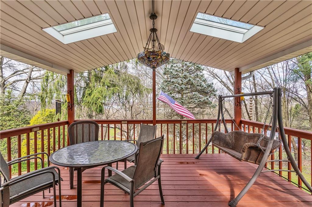 9 Quail Court Export, PA 15632 - Photo 9 of 35 Wonderful Covered Rear Deck Off Family Room with Sky Lights.