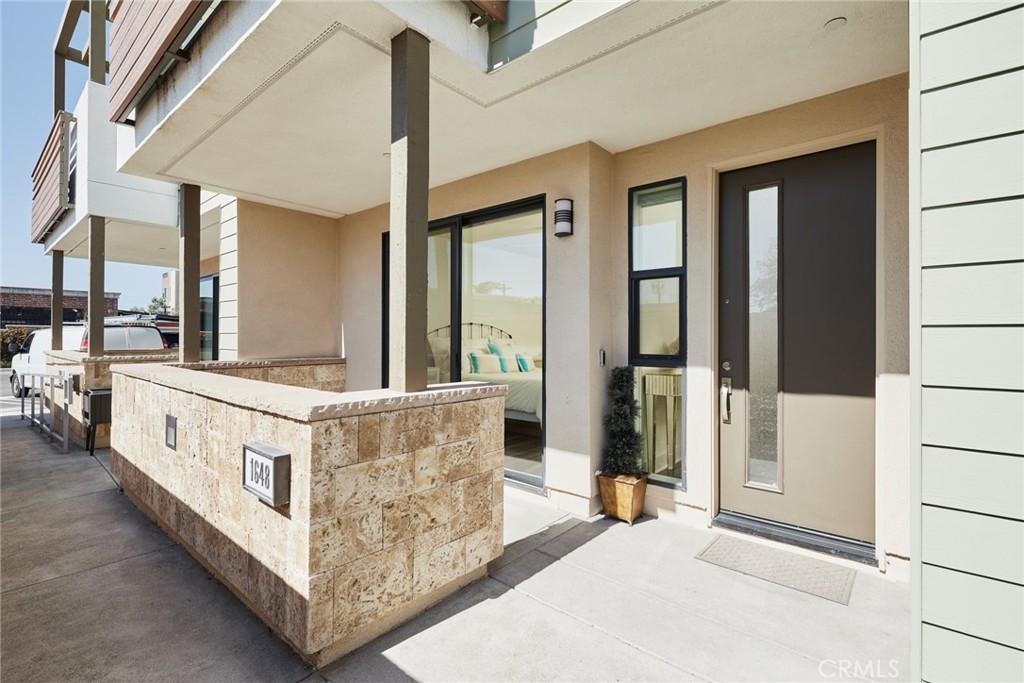 a view of an entryway with front door