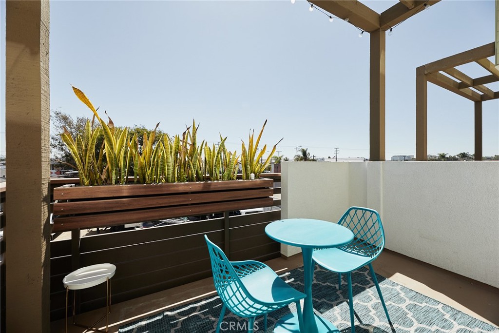 1648 Topanga Costa Mesa, CA 92627 - Photo 16 of 33 a view of a chairs and table in patio