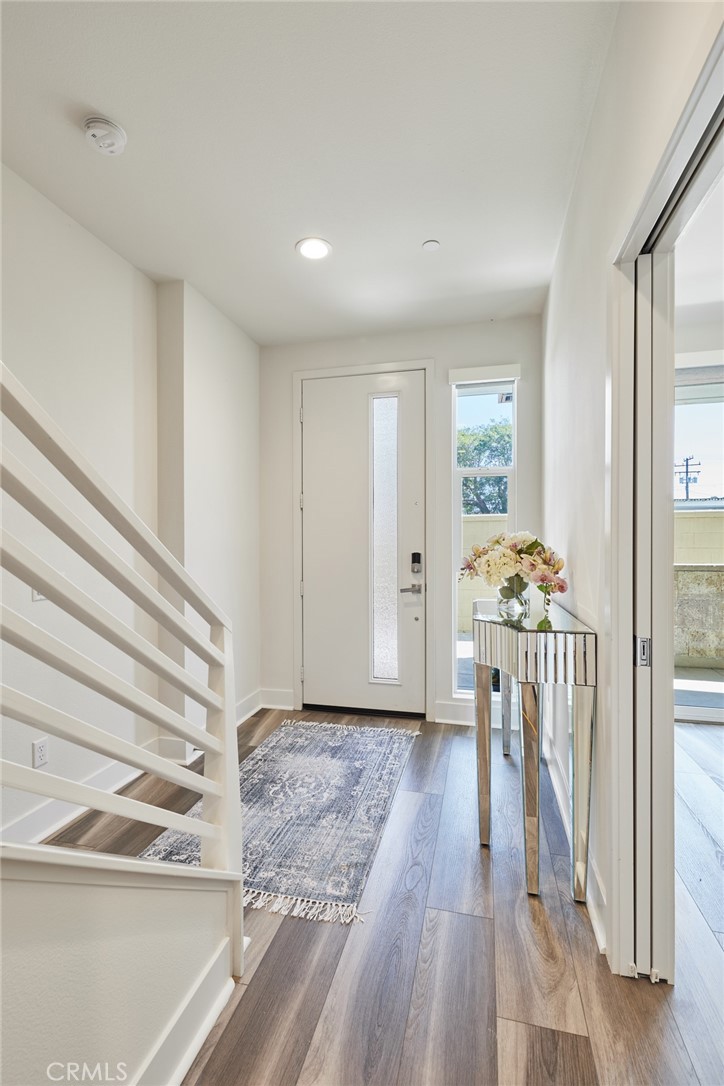 1648 Topanga Costa Mesa, CA 92627 - Photo 2 of 33 a view of entryway with wooden floor