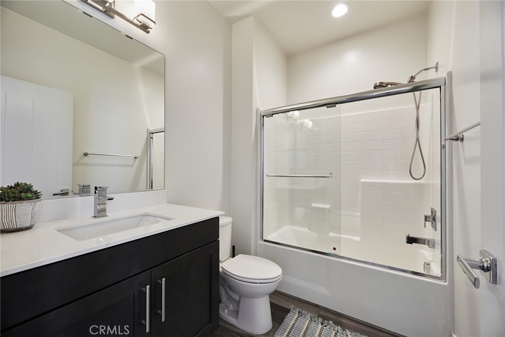 1648 Topanga Costa Mesa, CA 92627 - Photo 21 of 33 a bathroom with a sink toilet and shower