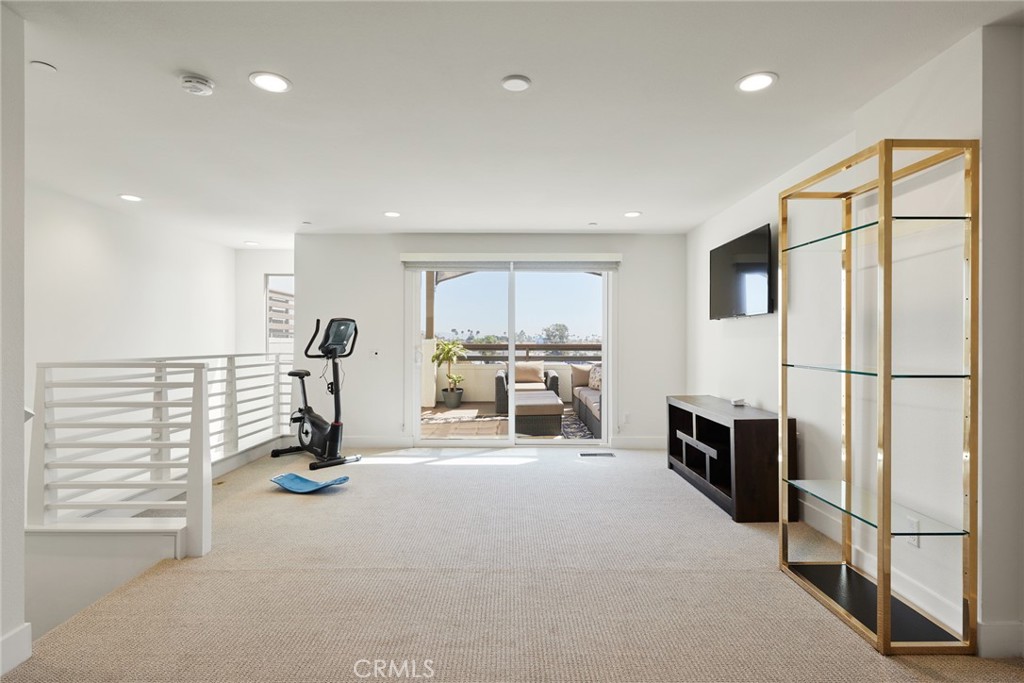 1648 Topanga Costa Mesa, CA 92627 - Photo 23 of 33 a view of a livingroom with table & chairs