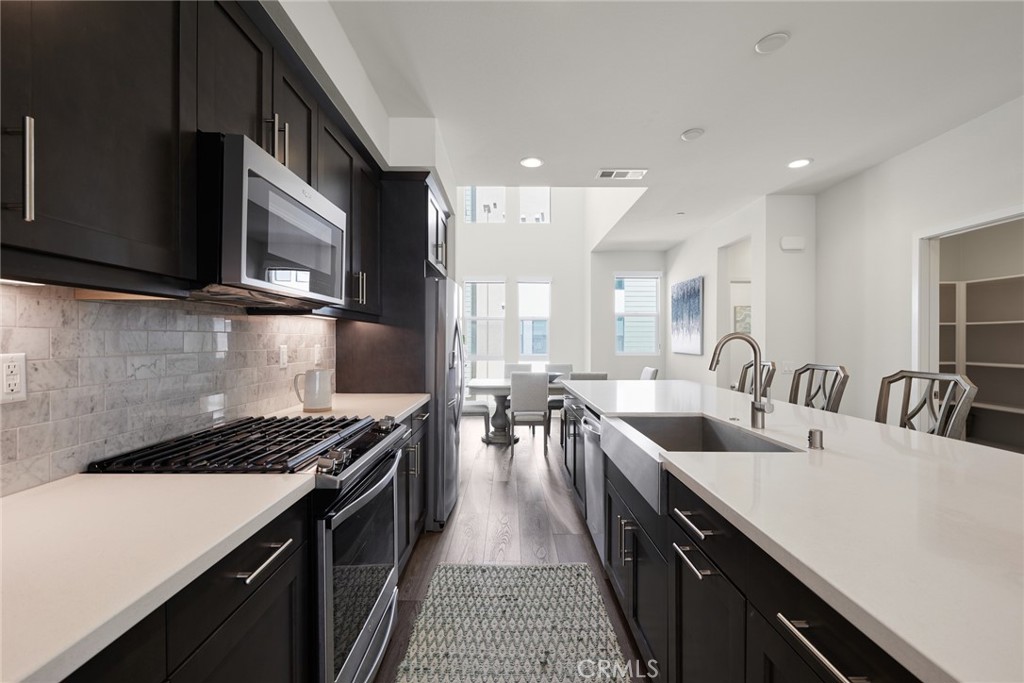 1648 Topanga Costa Mesa, CA 92627 - Photo 9 of 33 a kitchen with lots of counter top space