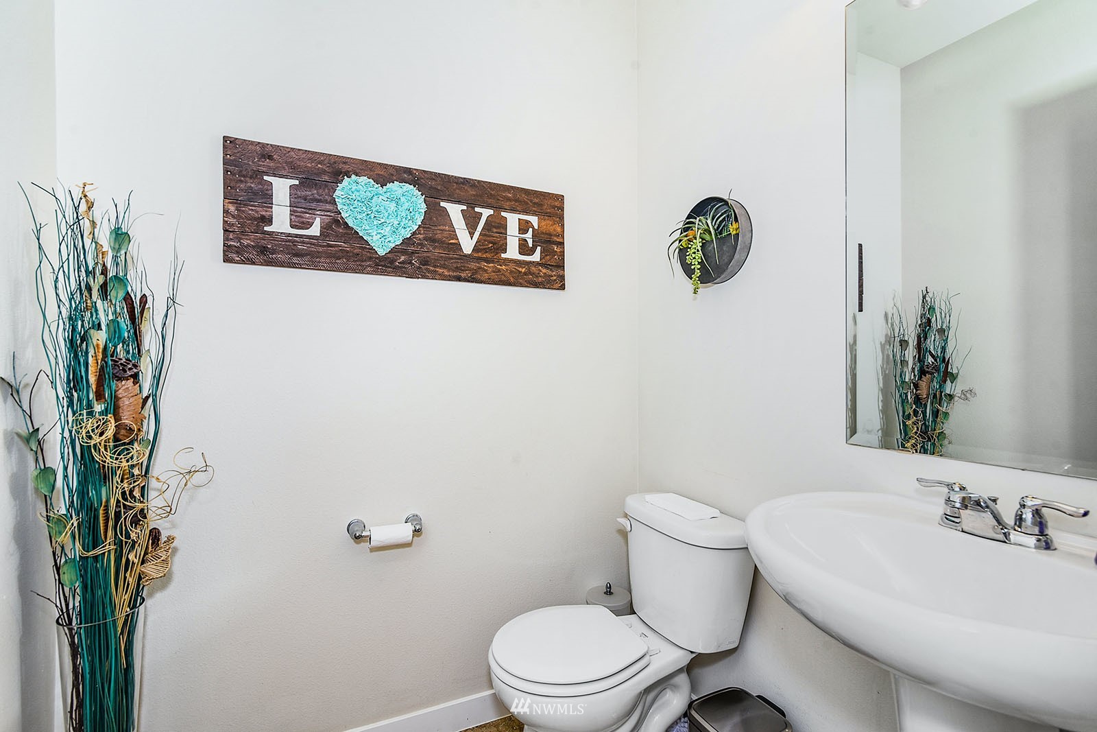 24220 Southeast 258th Way Maple Valley, WA 98038 - Photo 14 of 28 a bathroom with a toilet and a sink