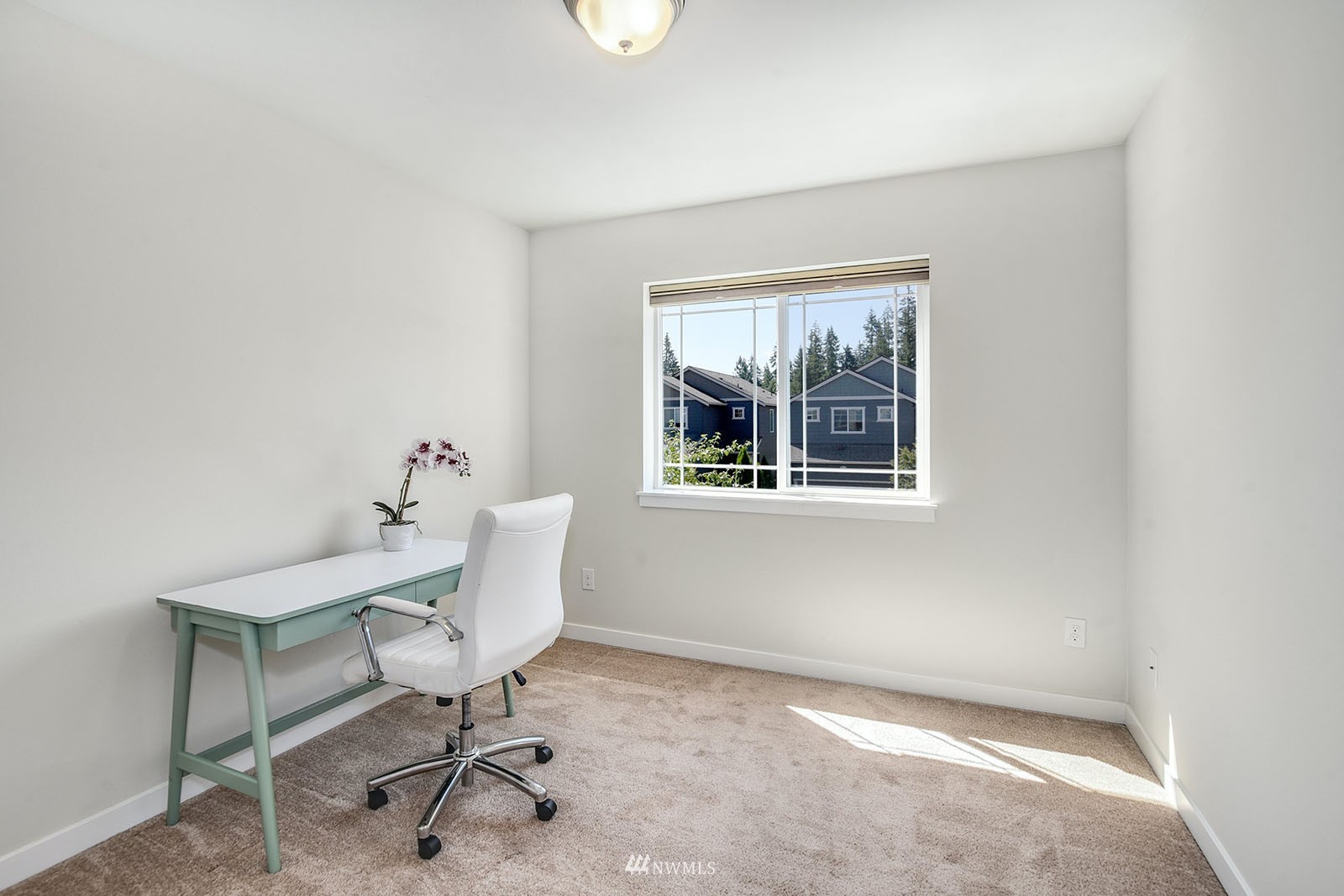 24220 Southeast 258th Way Maple Valley, WA 98038 - Photo 19 of 28 a workspace with furniture and a window