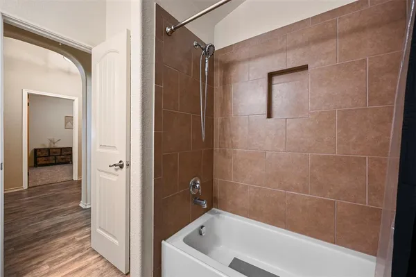 a bathroom with a bathtub