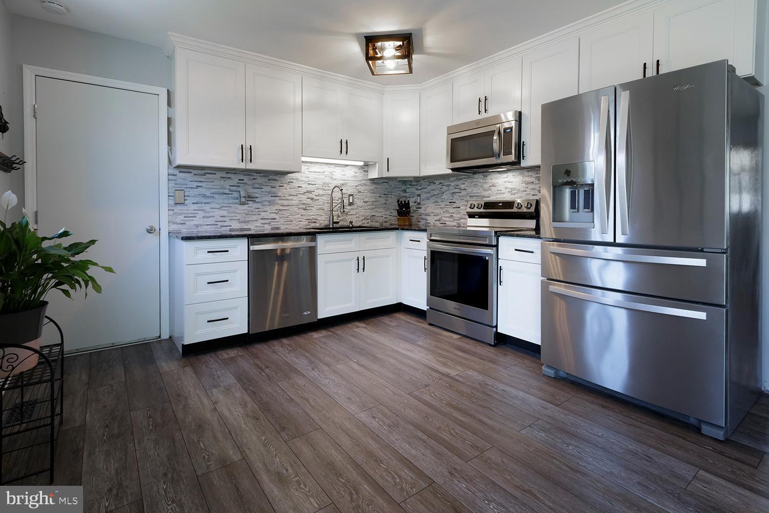 6 Brotherton Road Shamong, NJ 08088 - Photo 9 of 34 White kitchen with stainless steel appl