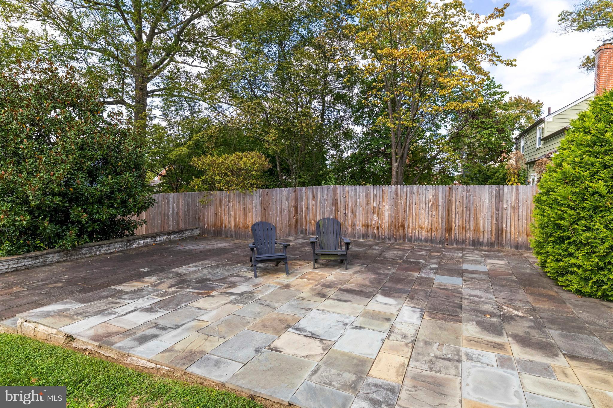 1508 Niessen Road Oreland, PA 19075 - Photo 33 of 44 a backyard of a house with table and chairs