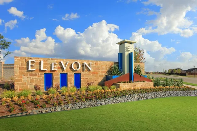 a view of a building with a yard