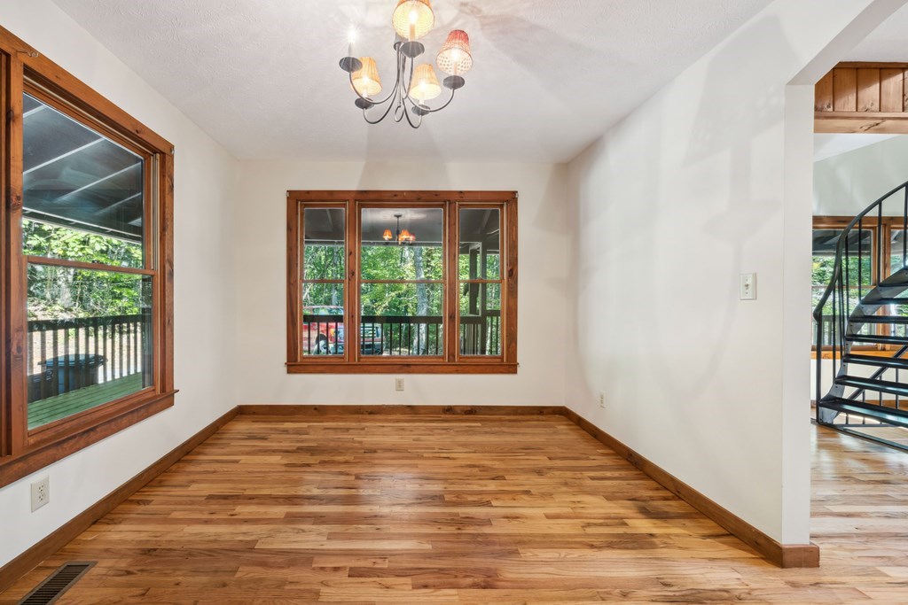 101 Menagerie Ridge Epworth, GA 30541 - Photo 17 of 48 a view of an empty room with a window