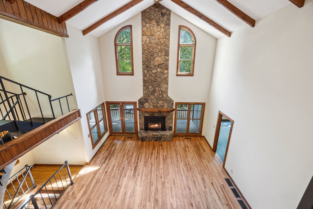 101 Menagerie Ridge Epworth, GA 30541 - Photo 24 of 48 a living room with furniture and a wooden floor