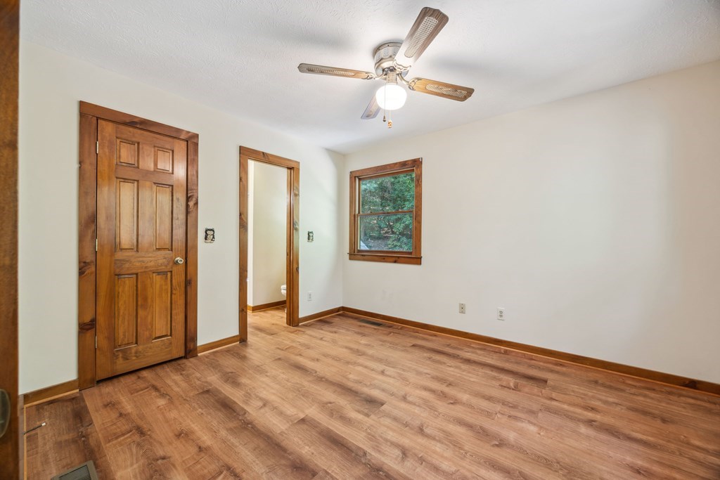 101 Menagerie Ridge Epworth, GA 30541 - Photo 25 of 48 a view of an empty room with a window