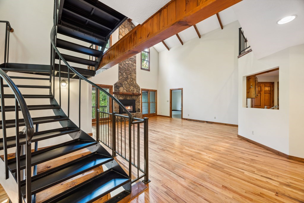 101 Menagerie Ridge Epworth, GA 30541 - Photo 3 of 48 a view of entryway with wooden floor and stairs
