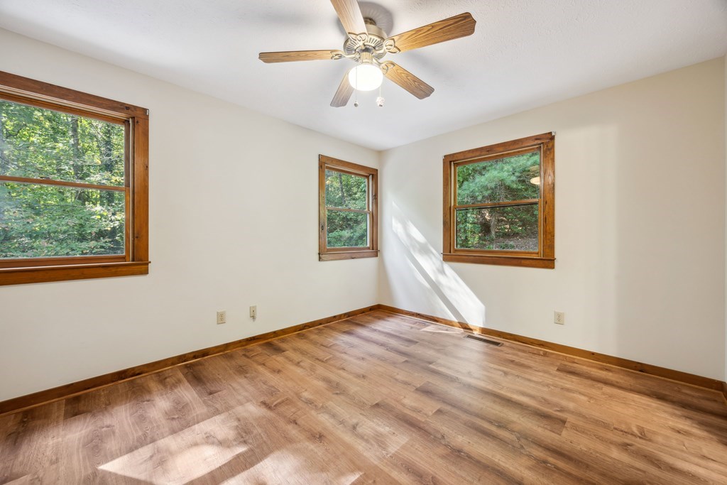 101 Menagerie Ridge Epworth, GA 30541 - Photo 32 of 48 a view of room with window ceiling fan and hardwood floor